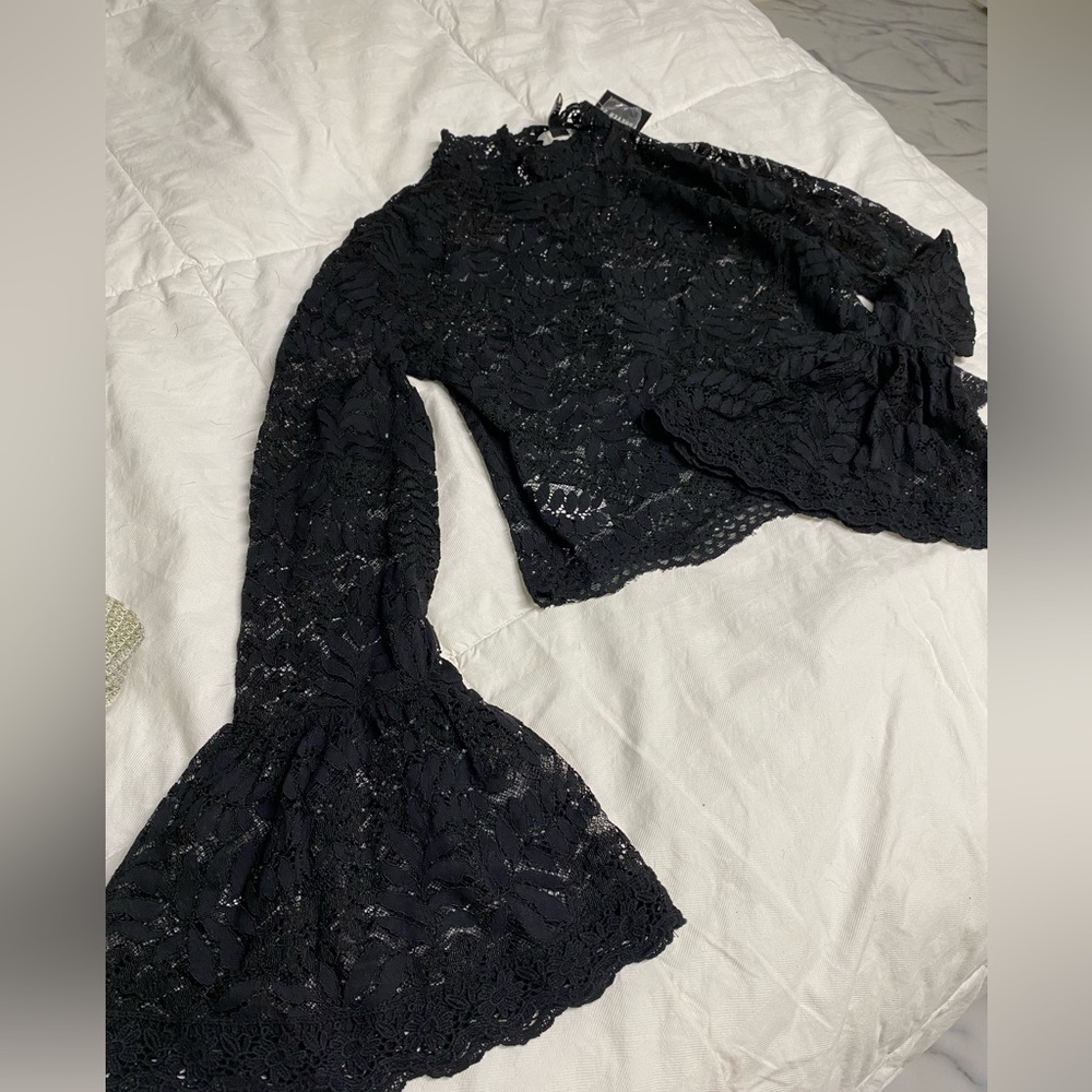 Bell bottom lace top